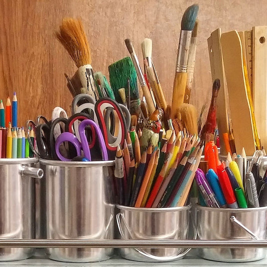 pencils in stainless steel bucket