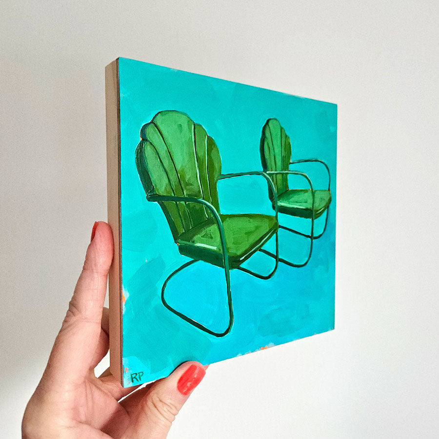 green shell back chairs