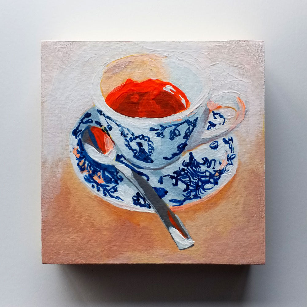 painting of an espresso in a blue and white demitasse at an italian bar